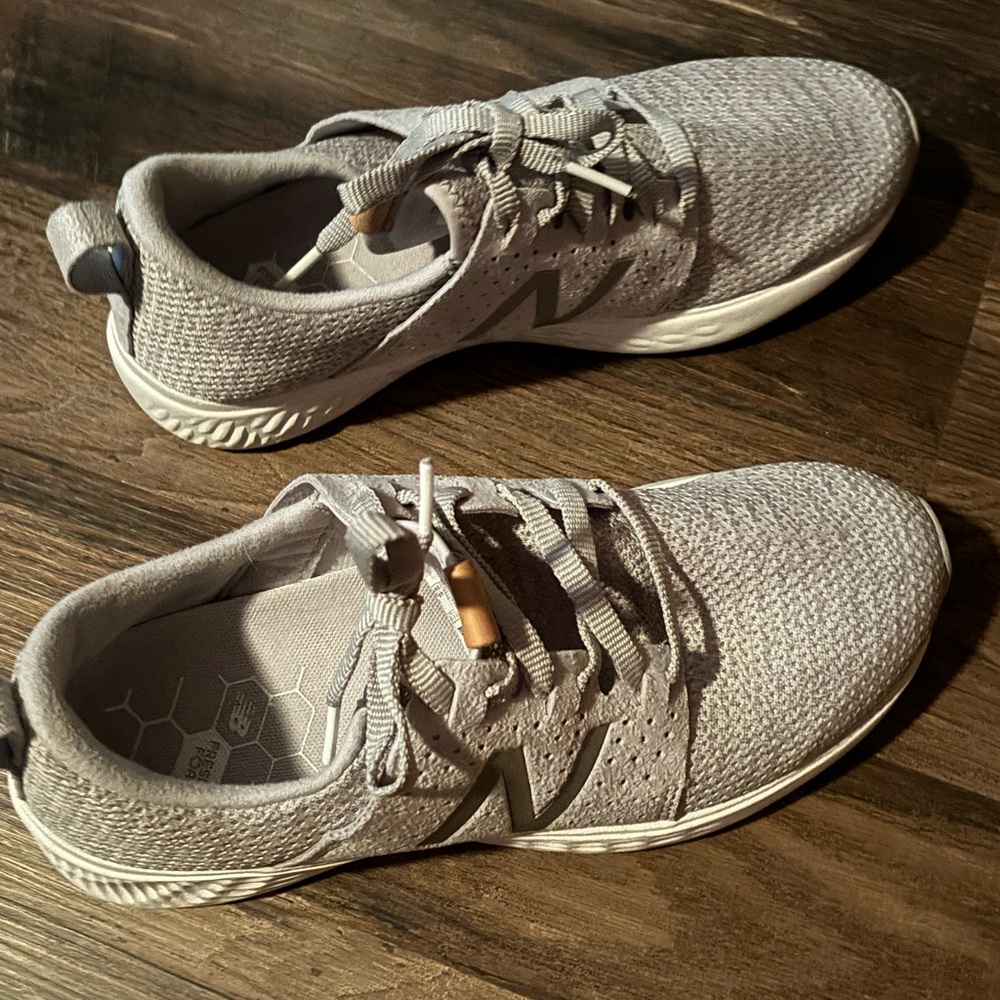 Women’s New Balance white sole gym shoes. Excellent condition. No wear/marks